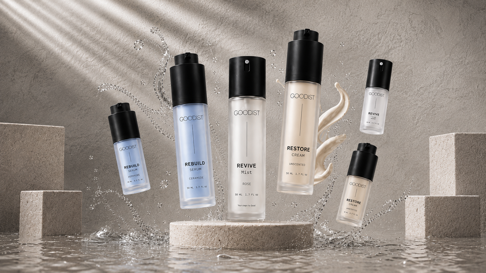Six Goodest skincare bottles in various sizes and translucent shades, arranged dynamically on and around a stone pedestal with water splashes and dramatic light rays in the background.